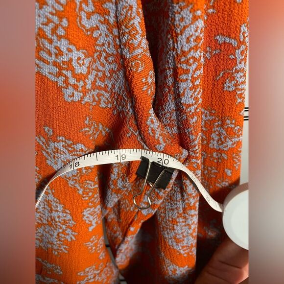 Unbranded women’s floral long sleeve rust colored romper NWOT - Picture 8 of 10